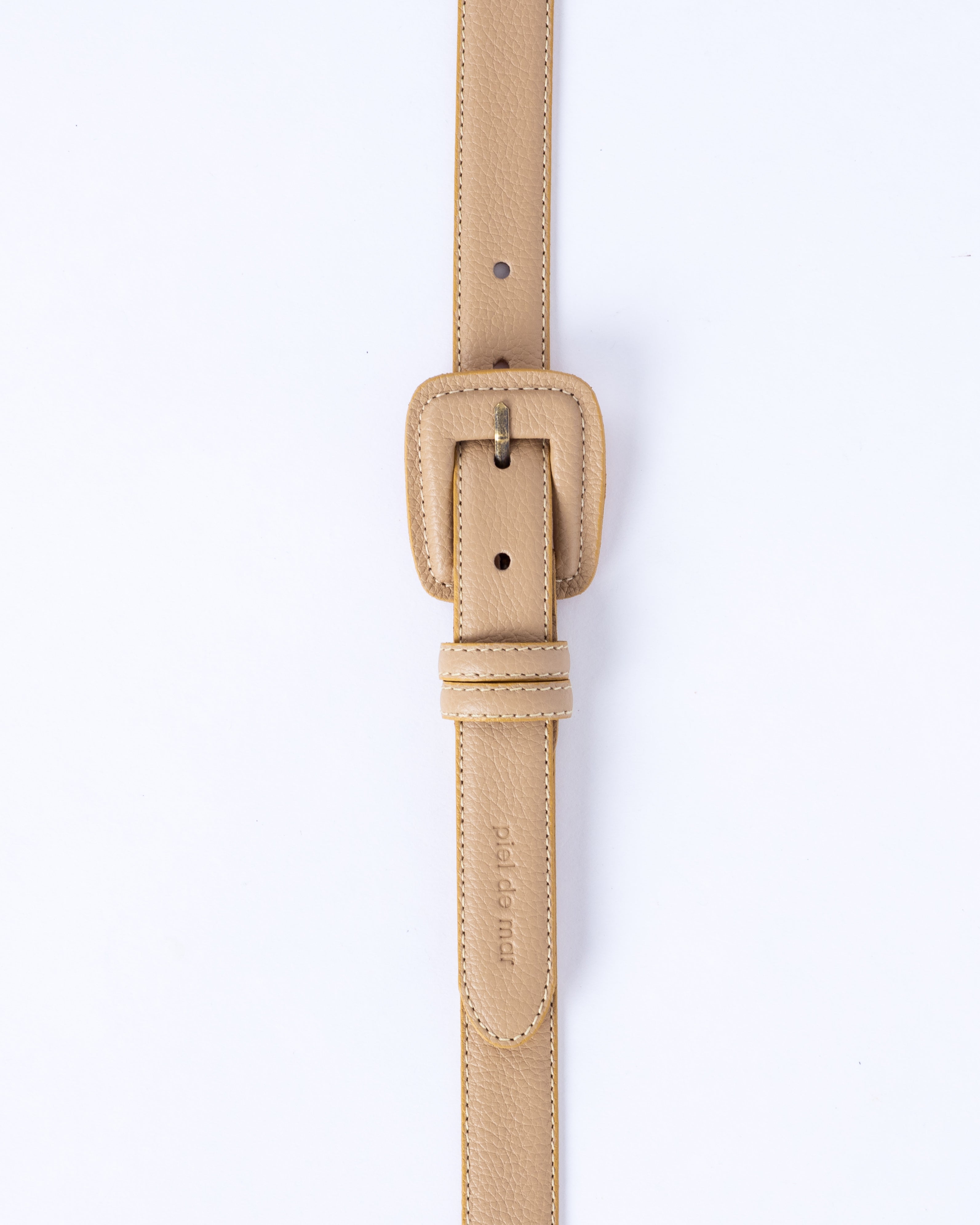 Beige leather belt on a white background