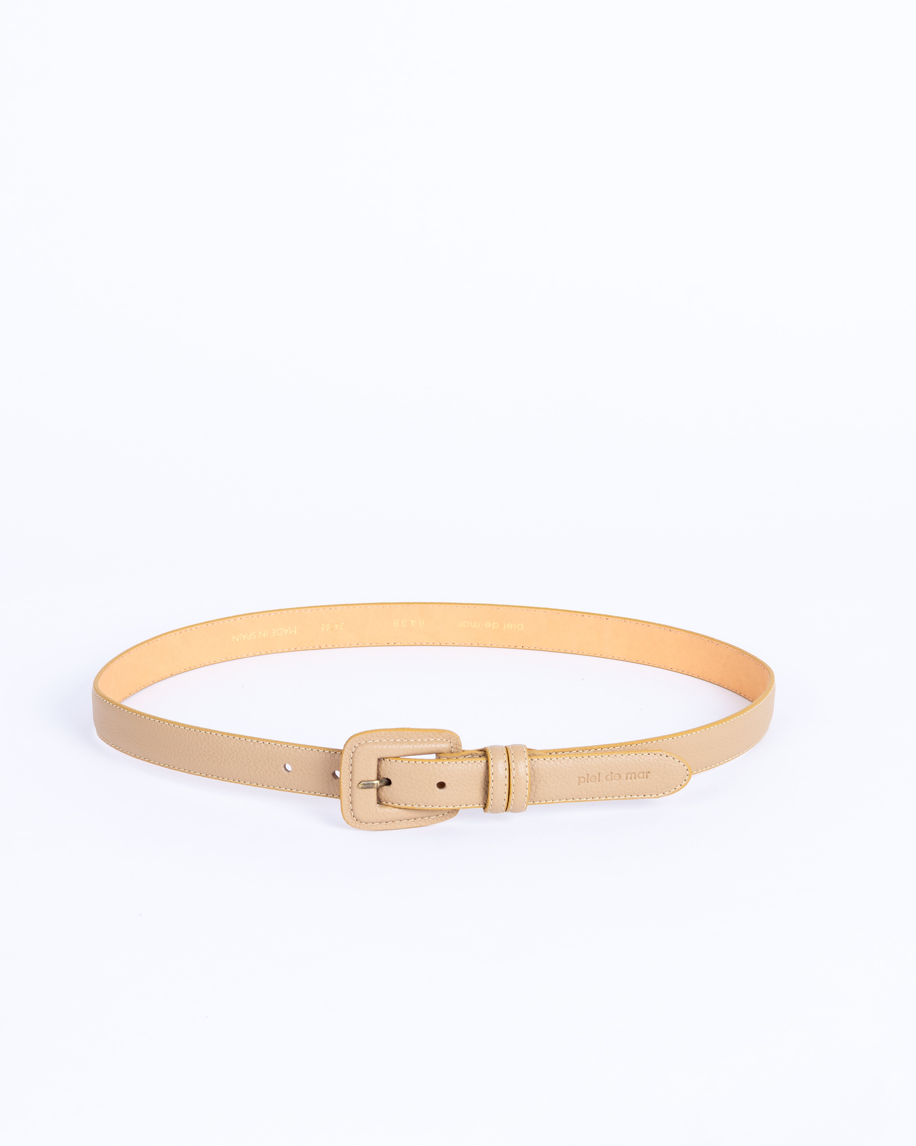 Beige leather belt on a white background